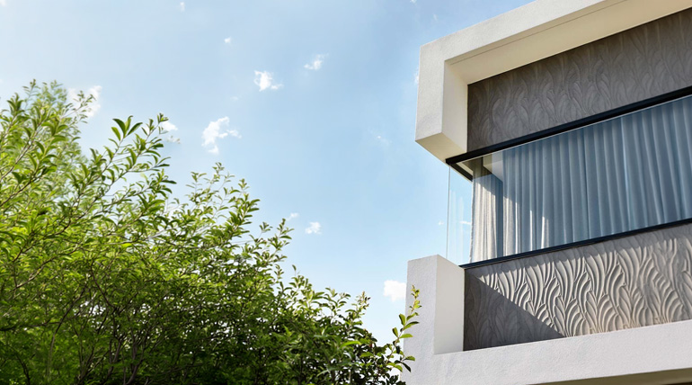 Weather-resistant exterior wall texture on building façade using Walplast HomeSure ScratchEx